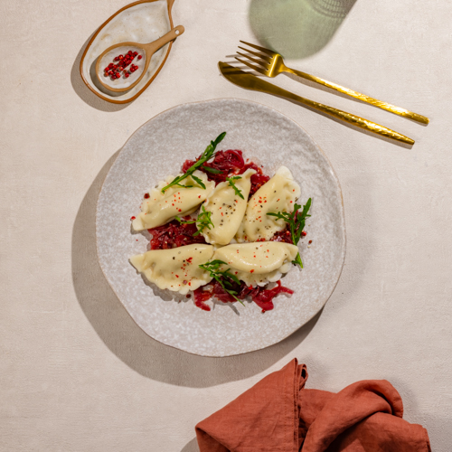 Pierogi z kiszoną kapustą i kurczakiem 